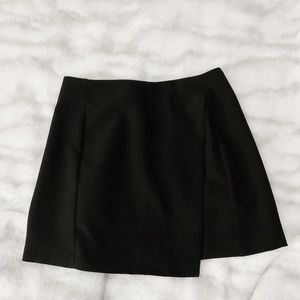 Asymmetrical black mini skirt